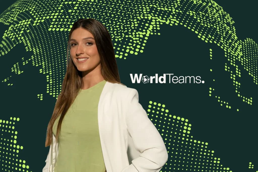 WorldTeams professional in front of a global map